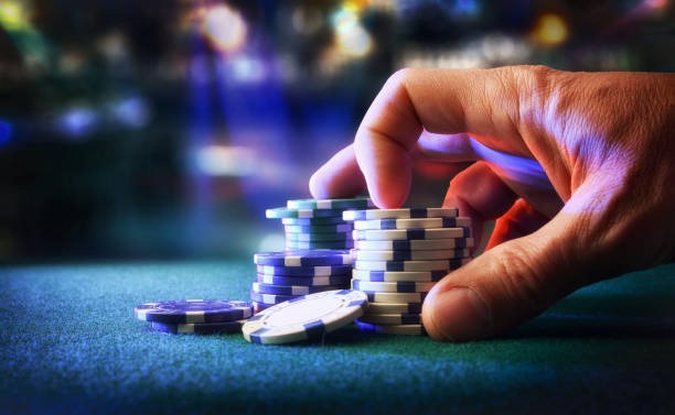Playtech roulette table interface showing live dealer, spin result, and updated account balance